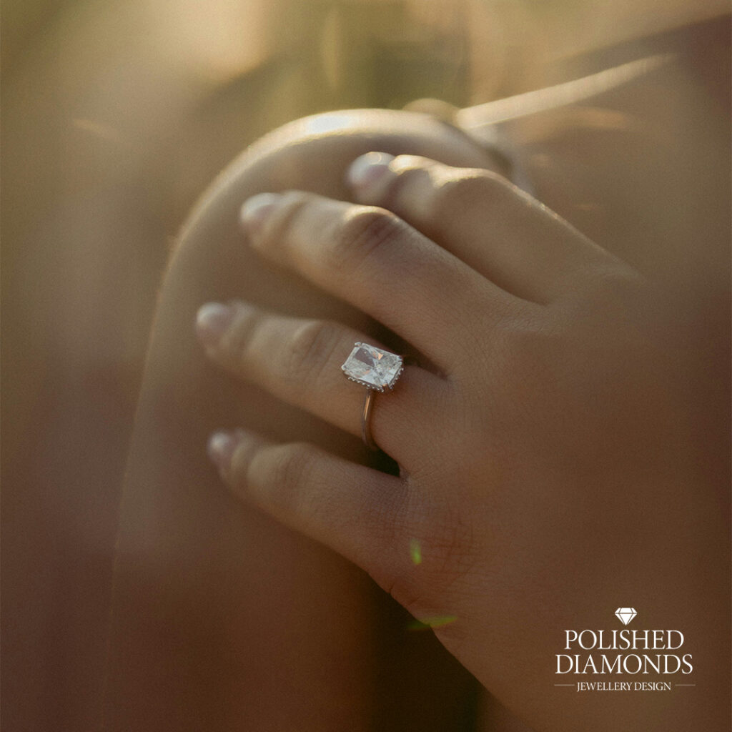 Radiant engagement ring on hand