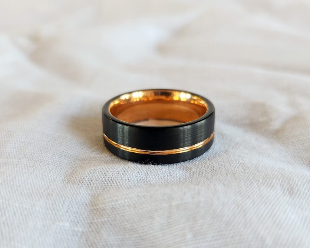 Black zirconium wedding ring with yellow gold inlay