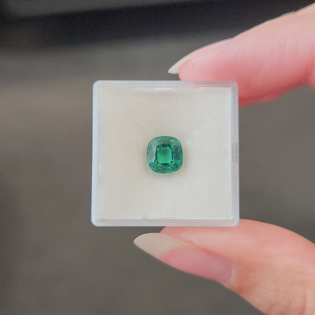 Cushion-cut emerald gemstone