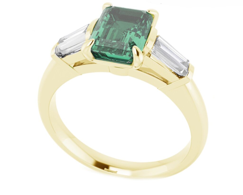 Emerald and tapered baguette trilogy ring