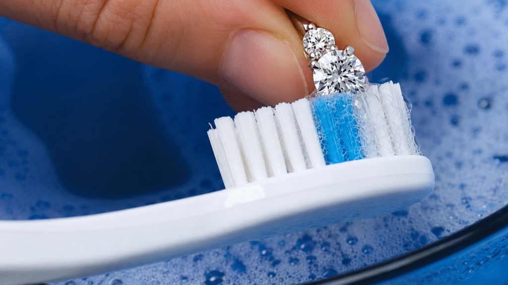 Cleaning a diamond ring with dishwashing liquid and a toothbrush