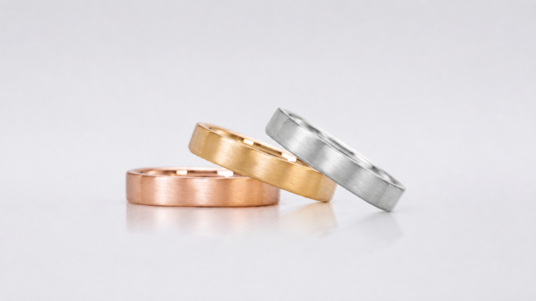 Brushed rose gold ring, yellow gold ring, and white gold ring