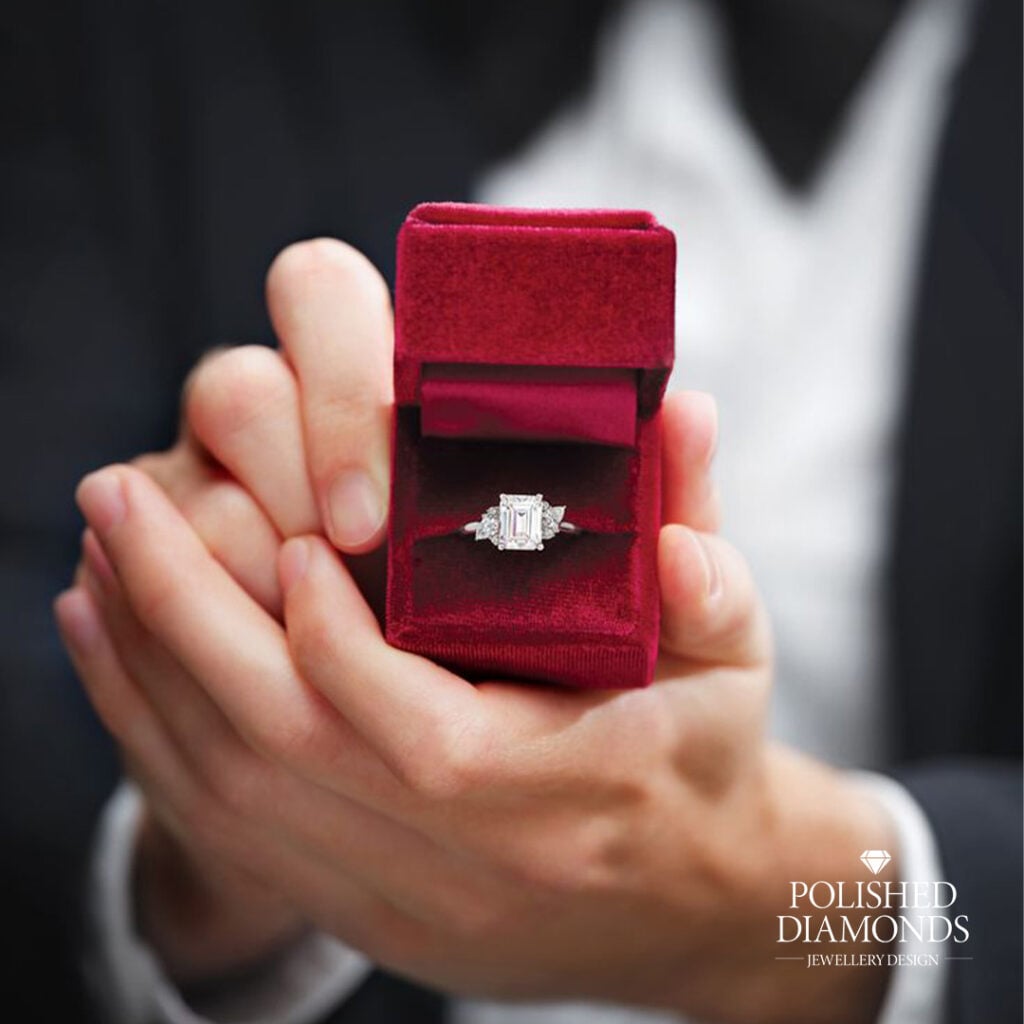 Diamond engagement ring in red ring box for proposal