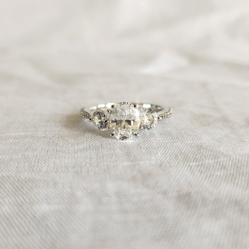 White gold trilogy engagement ring
