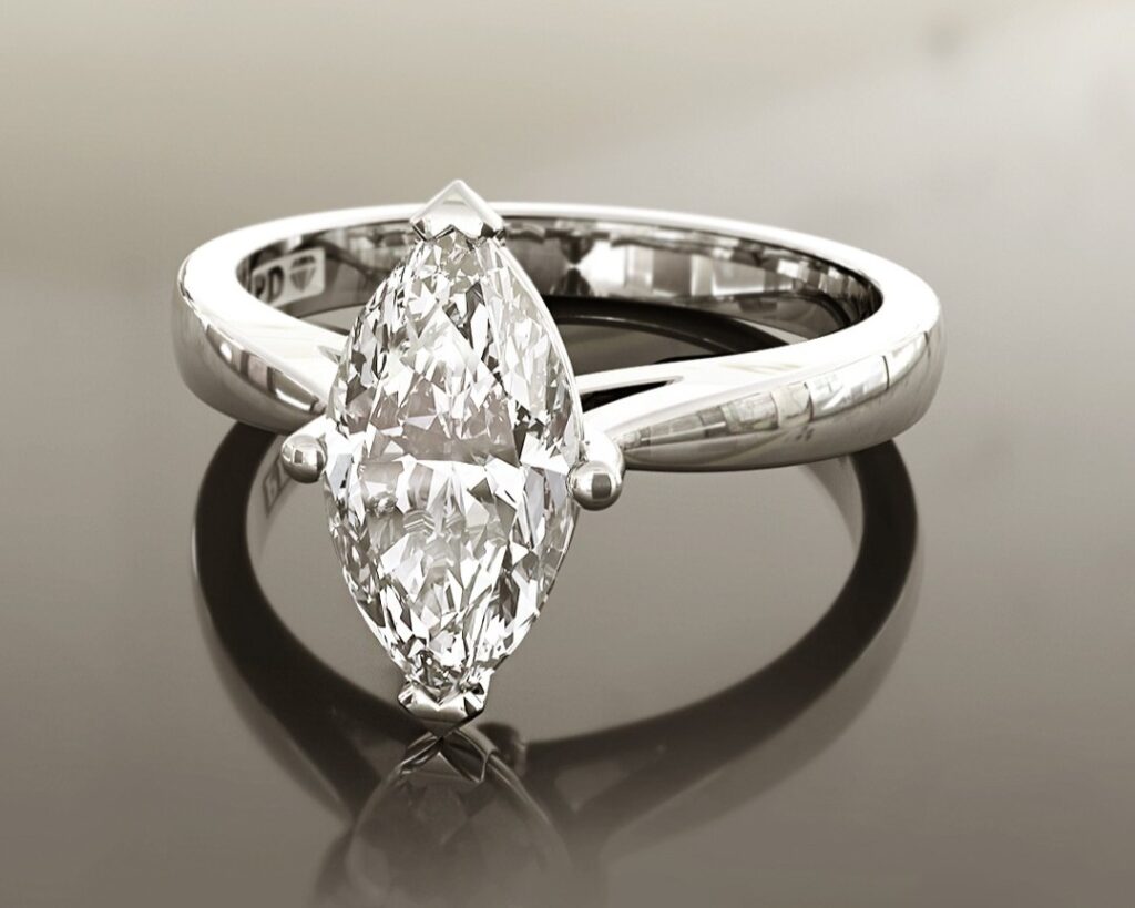 Platinum solitaire engagement ring with marquise diamond