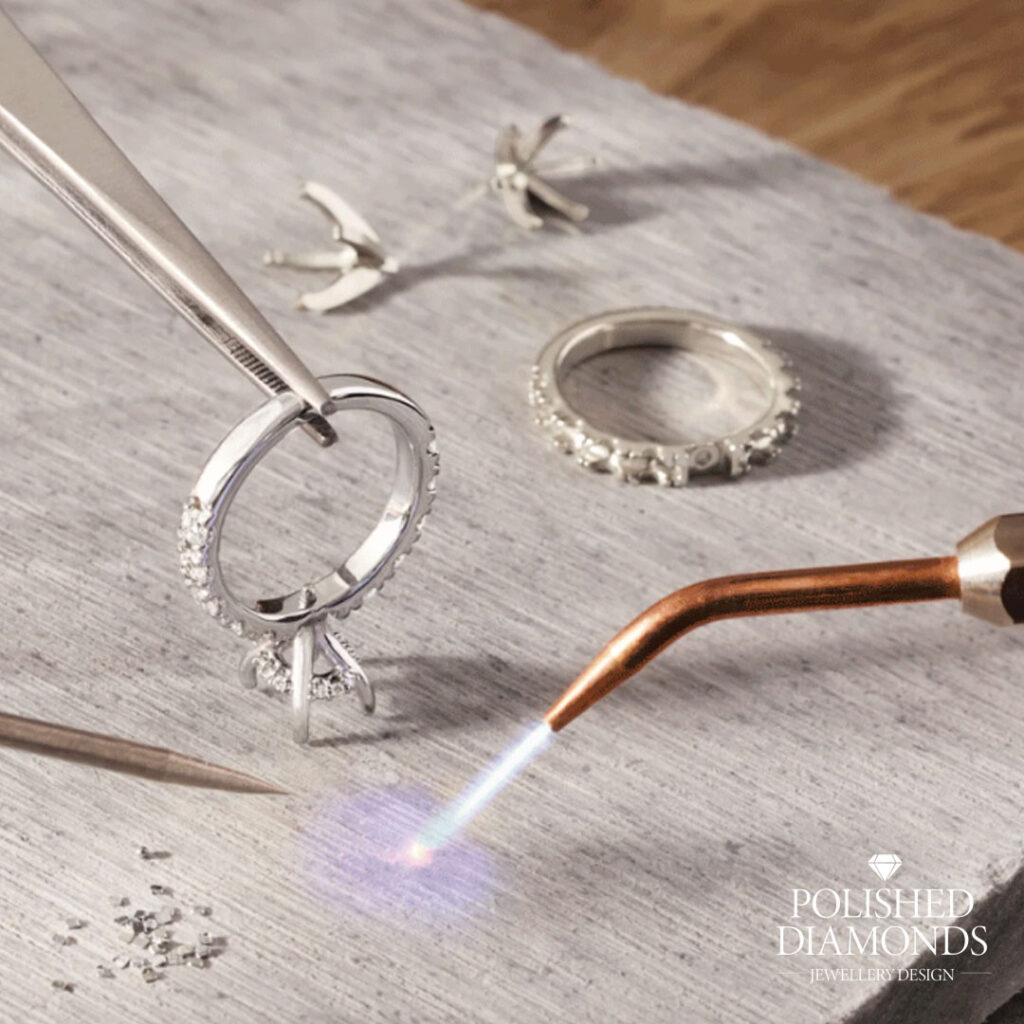 Wedding rings on jewellers bench