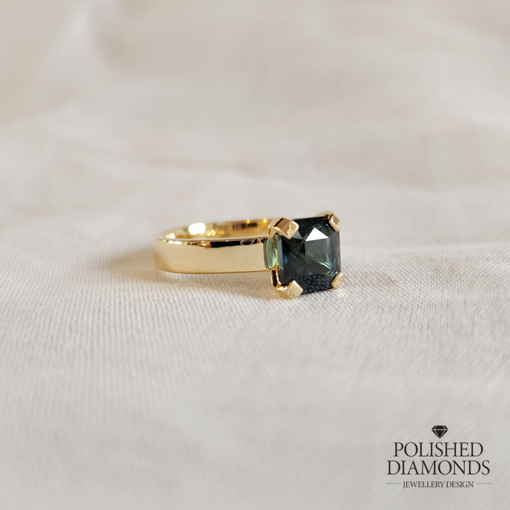 Emerald Asscher cut solitaire